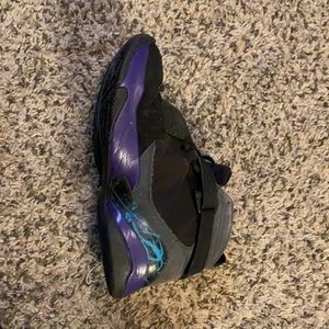 Men’s size 10 purple and black Nike Jordan’s